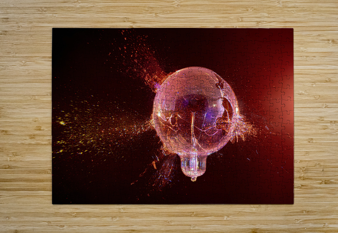 explosion of a glass bulb on a black background.  Gualtiero Boffi Puzzle printing