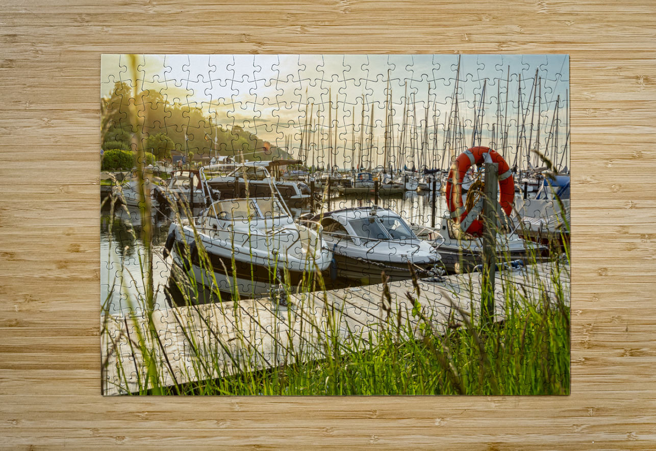 Sunset over pier and marina in Langballigau at the Baltic Sea in Northern Germany caladoart Puzzle printing