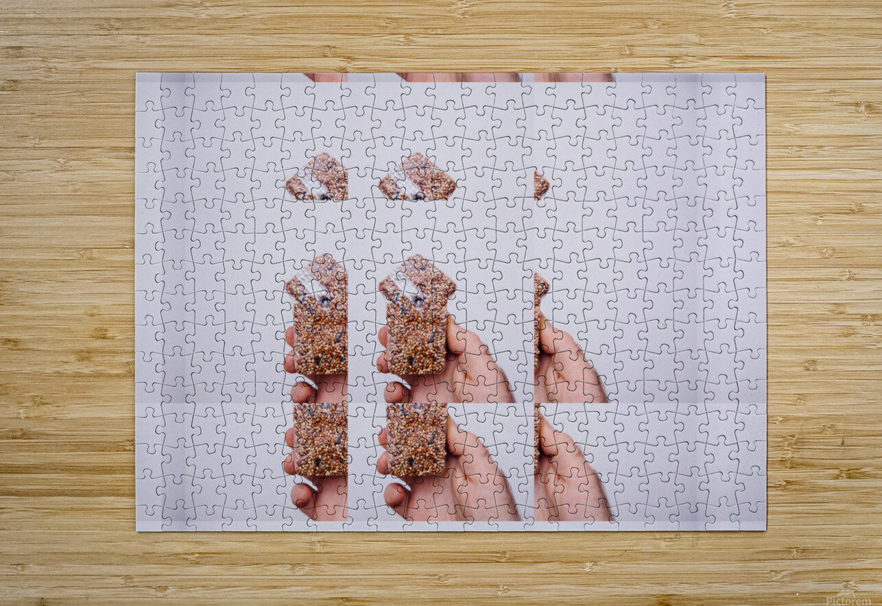 Hand Holding Seed Snack with Repetitive Pattern Adrian H  Puzzle printing