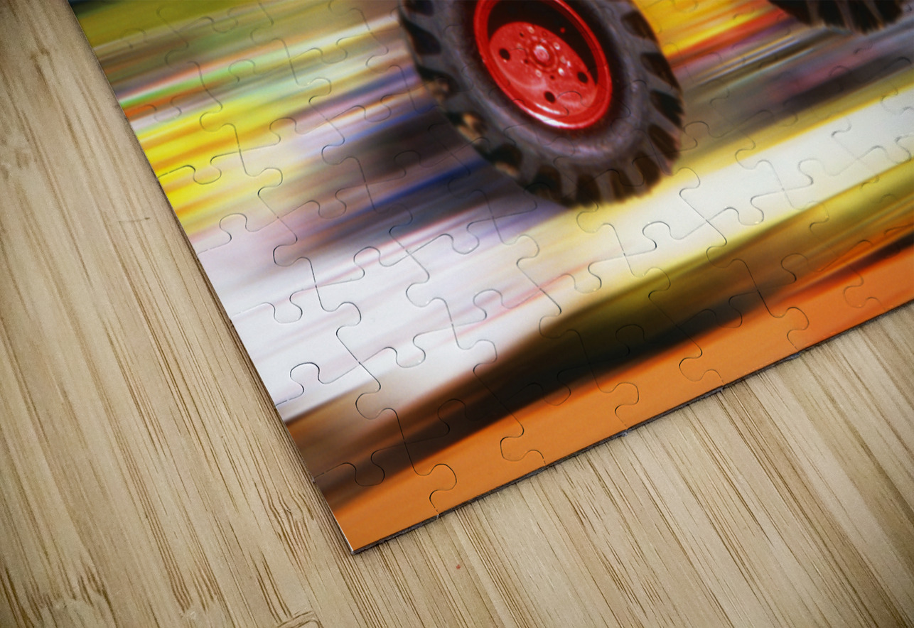 BIG WHEELED RED TRUCK JUMPING BLURRED BACKGROUND 184837 Panoramic Images Puzzle