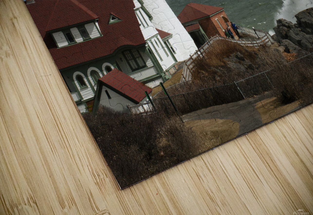 Waves Crash By Portland Head Lighthouse as Sun Breaks Through Clouds Allan Wood Puzzle