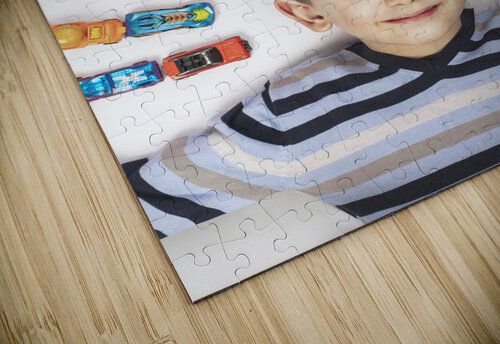 portrait of Caucasian child with toy cars  Gualtiero Boffi puzzle