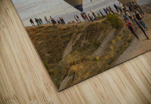 hot air balloon flies low over the city of goreme  Gualtiero Boffi puzzle