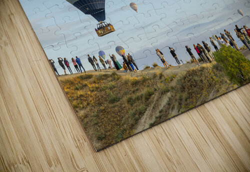 people watch the spectacle of hot air balloons flying over gorem Gualtiero Boffi puzzle