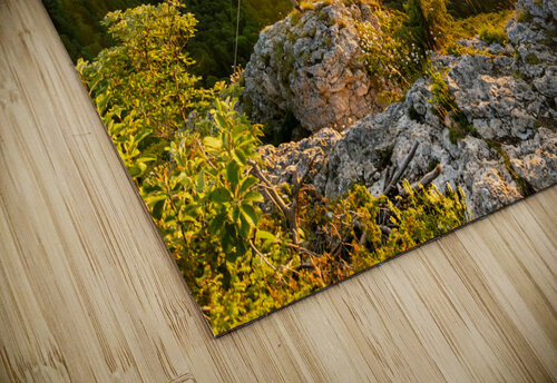 Beautiful sunset over a rock ledge and summit cross Wackerstein in the Swabian Alps in Southern Germany caladoart puzzle