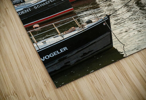 Boats in the historic museum harbor in Hamburg Övelgönne at the Elbe River at sunrise  caladoart puzzle