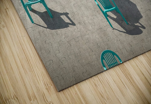 Young blonde woman holding up a turquoise umbrella on a beach sitting through many red and teal chairs in the sand on a sunny day Artmood Visualz puzzle