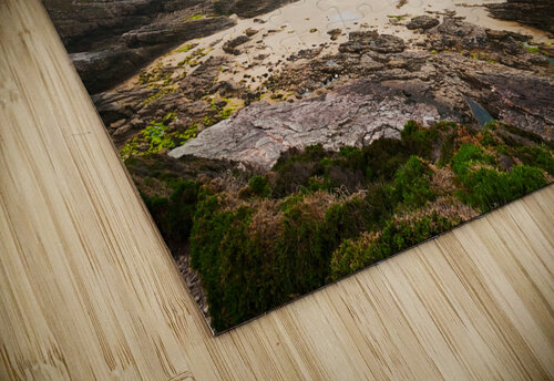 Beach with rocks and cloudy dark sky Philippe Lejeanvre puzzle