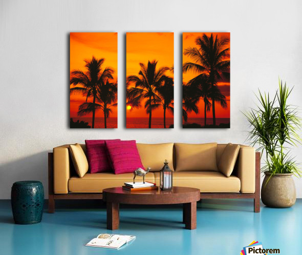 Rows Of Palm Trees Silhouetted By Fiery Orange Sunset Over Ocean