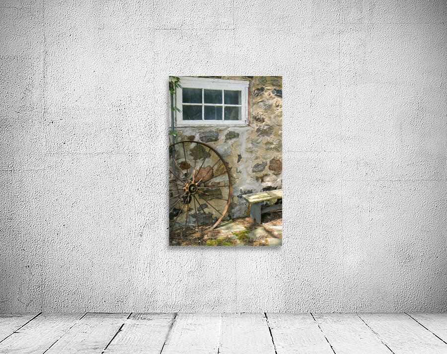 Rusty Wheel and Stone Wall Wall Preview