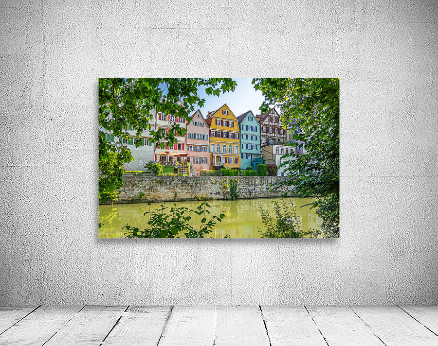Traditional colourful half-timbered houses at the riverfront of Tübingen Germany  Wall Preview