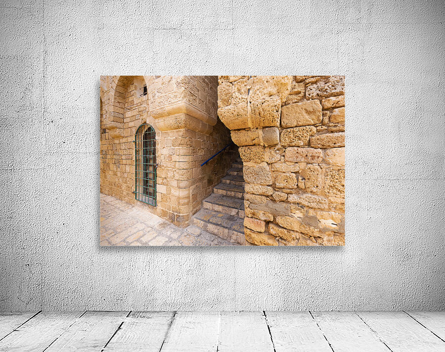 Israel Tel Aviv Namal Yafo historic Old Jaffa port with art galleries boutiques and old houses Wall Preview