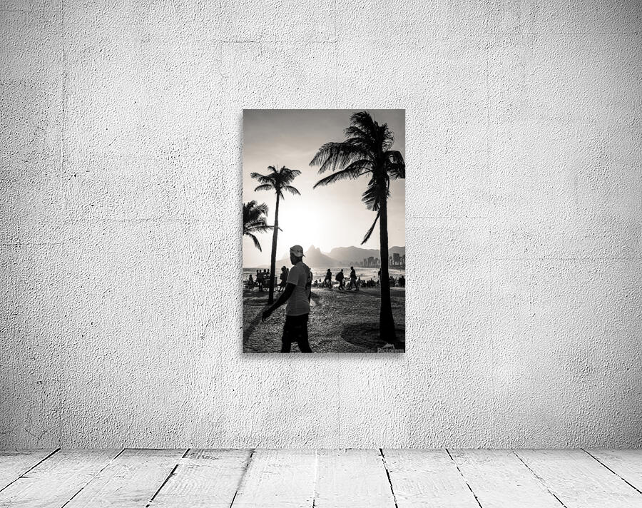Black and white photo of people strolling along the promenade at Ipanema Beach in Rio de Janeiro  Wall Preview