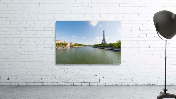 Paris and Eiffel tower with river Seine in the foreground on a sunny day Wall Preview