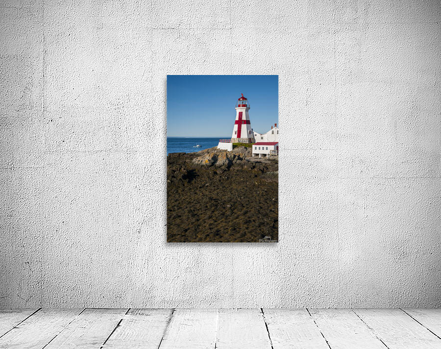 Fishing Boat Approaches Head Harbor Light a Canadian Lighthouse During Low Tide by Allan Wood