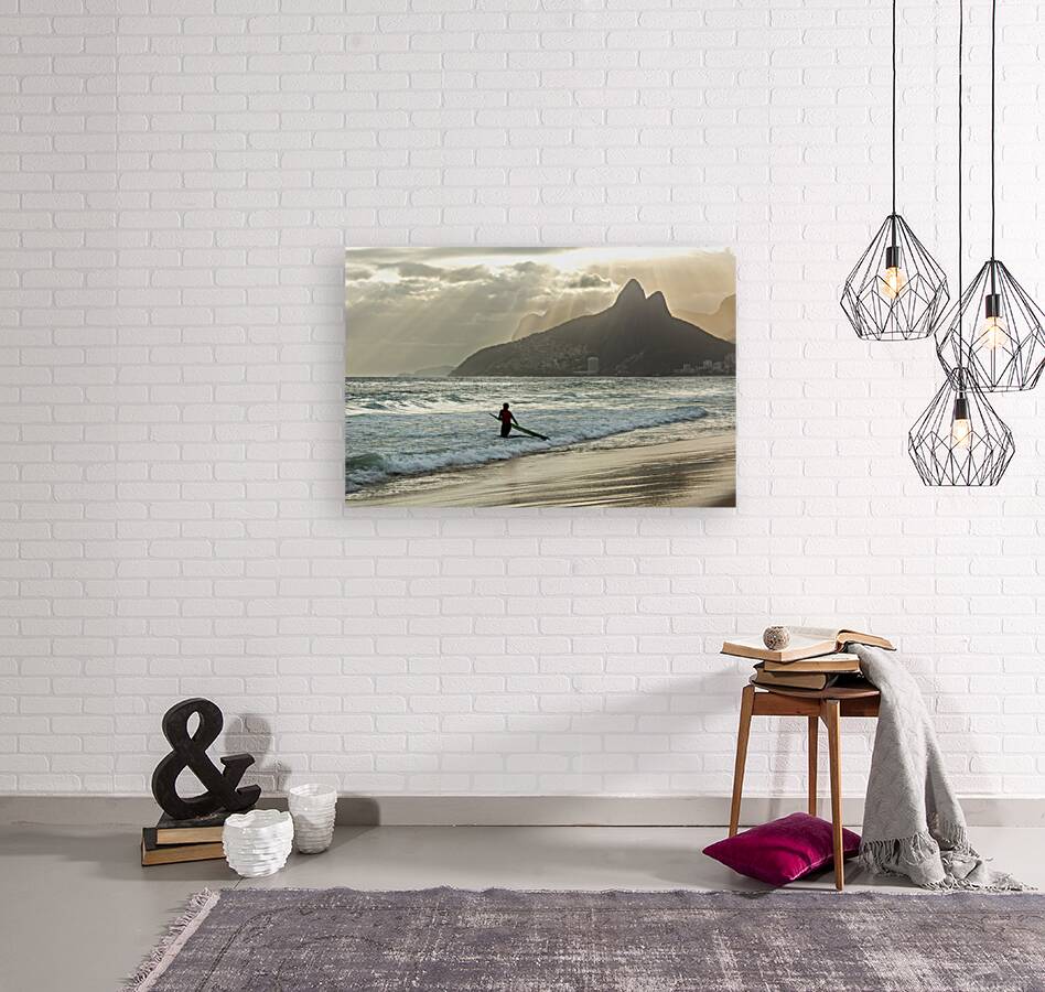 Surfer entering the water during dramatic sunset at Ipanema Beach in Rio de Janeiro  Reproduction