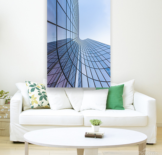 Blue curved glass skyscraper facade against sky Reproduction