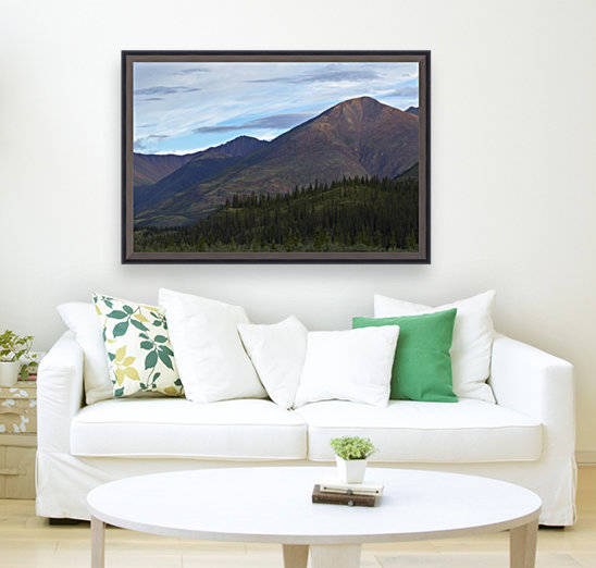 Late afternoon light shining on the mountains along the Wind River in the Peel Watershed; Yukon, Canada by PacificStock