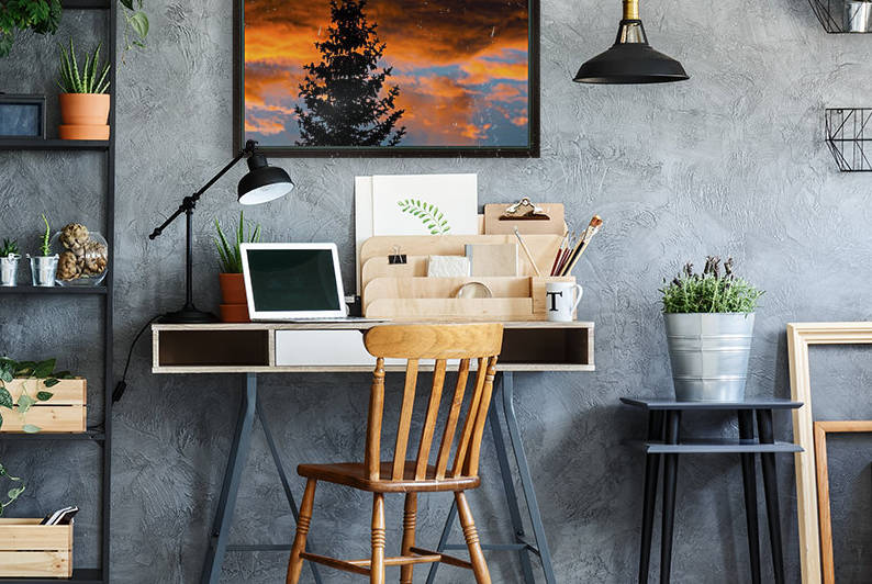 Silhouette of evergreen trees against dramatic colourful clouds at sunset; Calgary, Alberta, Canada by PacificStock