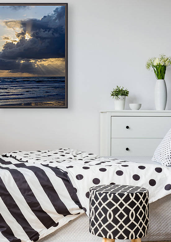 Sunbeams flow through holes in the clouds along the Oregon Coast; Cannon Beach, Oregon, United States of America by PacificStock