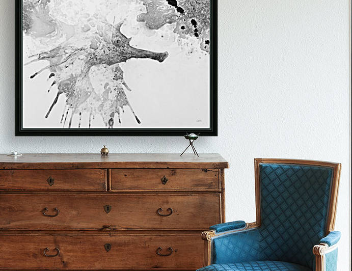 Illustration of fish with long nose surrounded by splashes and mottled abstract by PacificStock