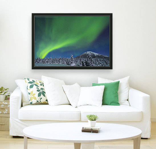 The aurora glows in the sky above Donnelly Dome and a snowy, moonlit landscape, south of Delta Junction; Alaska, United States of America by PacificStock