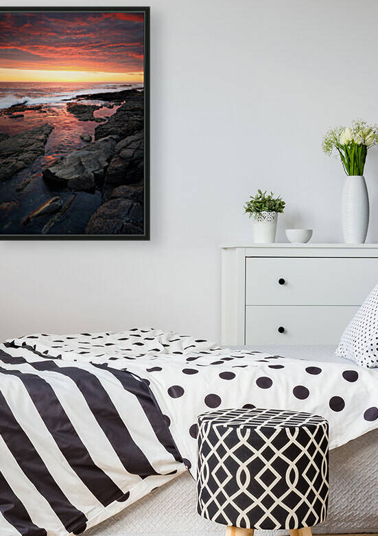 Sunset over rocky coastline by Johan Swanepoel