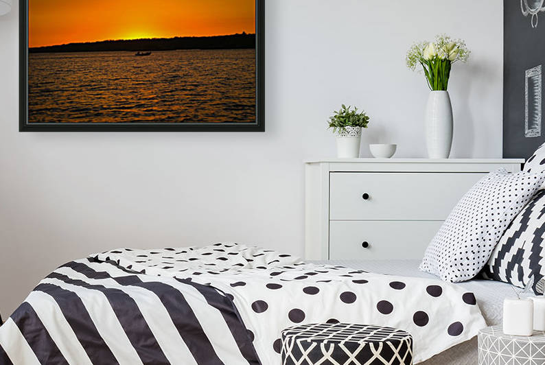 SUNSET AND BOAT BY THE WATER by Michael