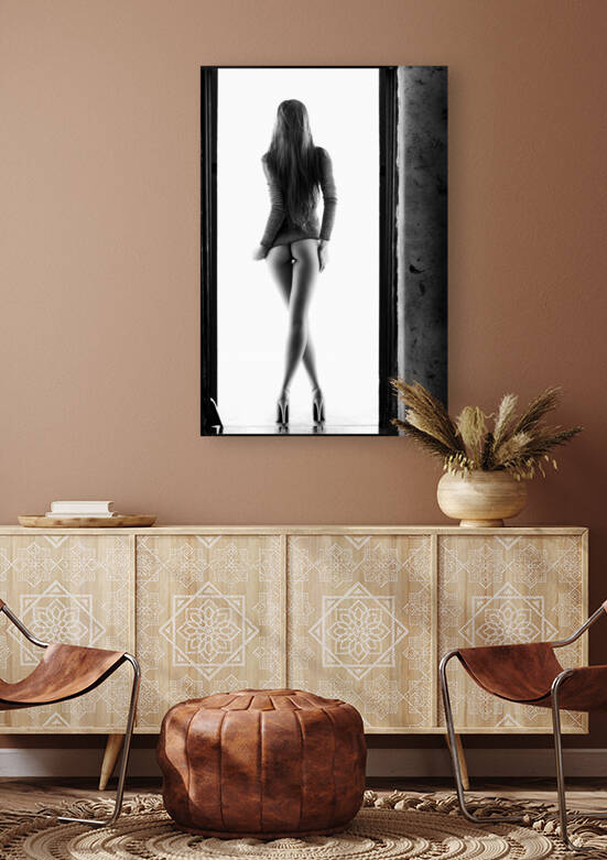 Woman standing in doorway by Johan Swanepoel