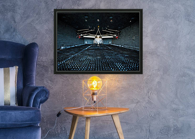 A CV-22 Osprey hangs in the anechoic chamber at Eglin Air Force Base. by StocktrekImages