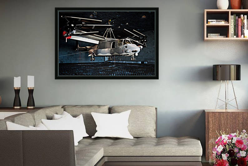 A CV-22 Osprey hangs in a anechoic chamber. by StocktrekImages