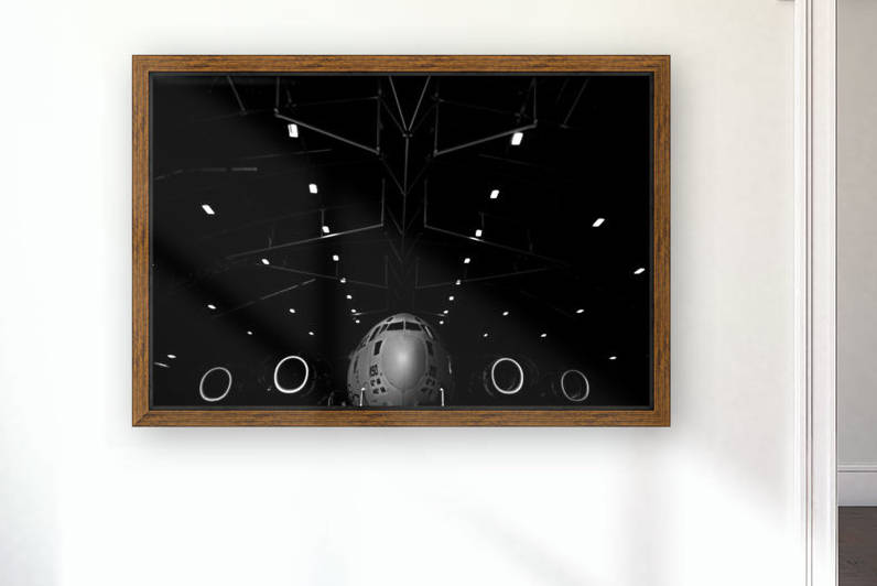 A C-17 Globemaster III sits in a hangar at McChord Field Air Force Base Washington. by StocktrekImages