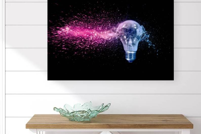 blue and red electric bulb shattering by Gualtiero Boffi