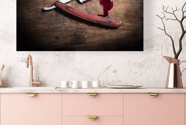 Bloody razor on wood by Gualtiero Boffi