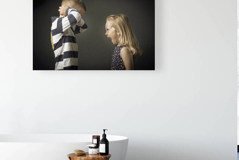 child screams and child plugs his ears  by Gualtiero Boffi