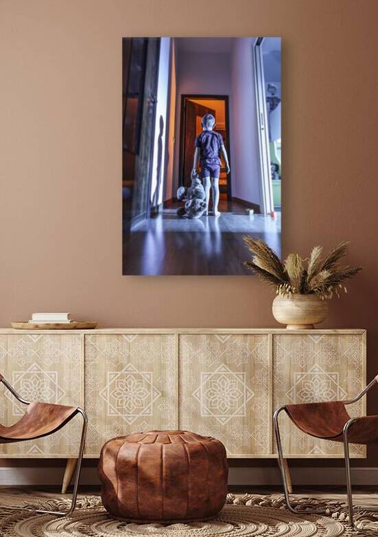 child with teddy bear in a domestic place by Gualtiero Boffi