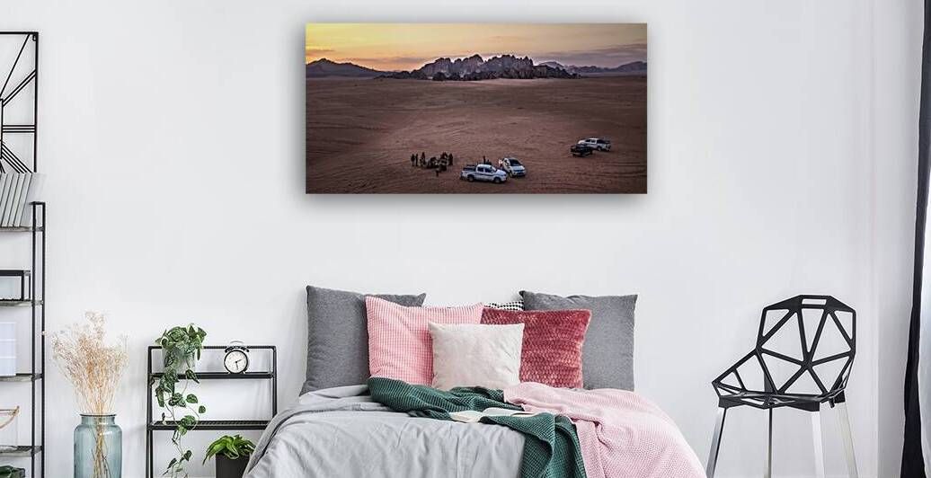 tourists in the wadi rum desert at sunset by Gualtiero Boffi