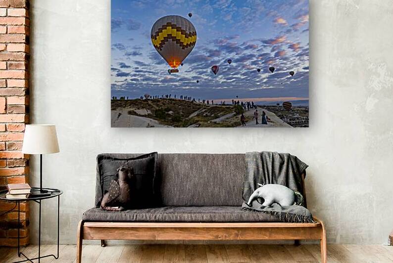 dozens of tourists observe and photograph the spectacle of the h by Gualtiero Boffi