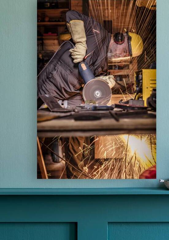 man with grinder in action by Gualtiero Boffi