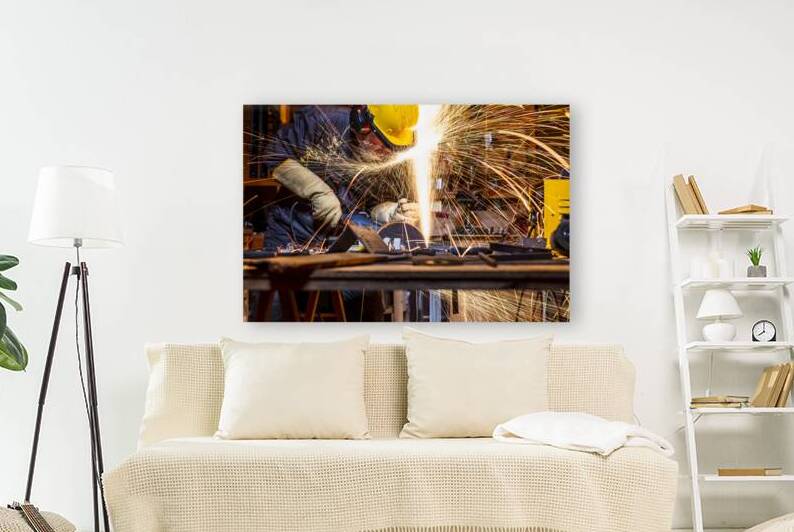 man with grinder in action by Gualtiero Boffi