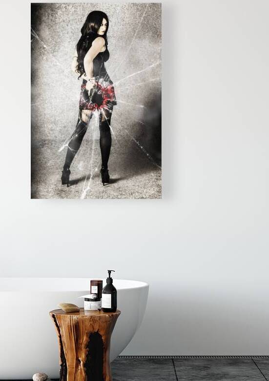 Sexy brunette woman holding gun with deadly style by Jorgo