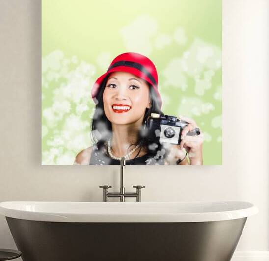 Woman taking photographs with vintage camera by Jorgo