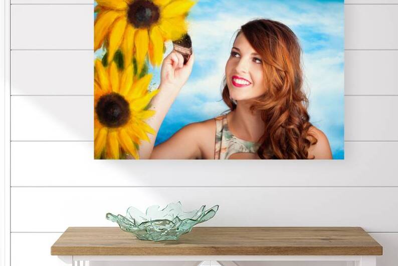 Female artist drawing sun flowers during summer by Jorgo