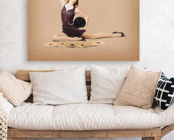 Glamorous pinup girl holding vinyl LP records by Jorgo