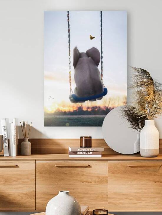 Baby Elephant Swing behind sunset by Gen Z