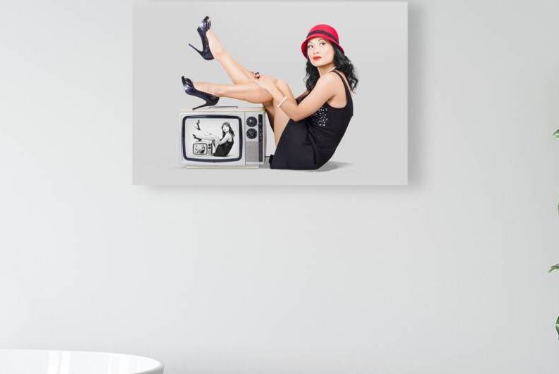 Lovely asian pinup girl posing on vintage tv set by Jorgo
