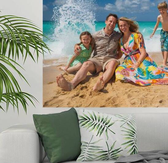 A vibrant beach scene on a sunny day. A man and his wife are sitting on the beach. by mohamedelfaleh