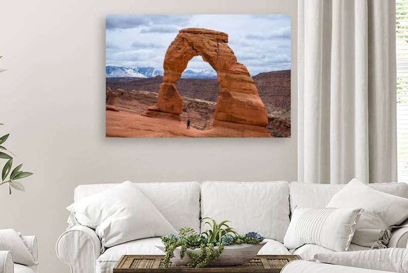 Standing Under Delicate Arch Utah by Jennifer White