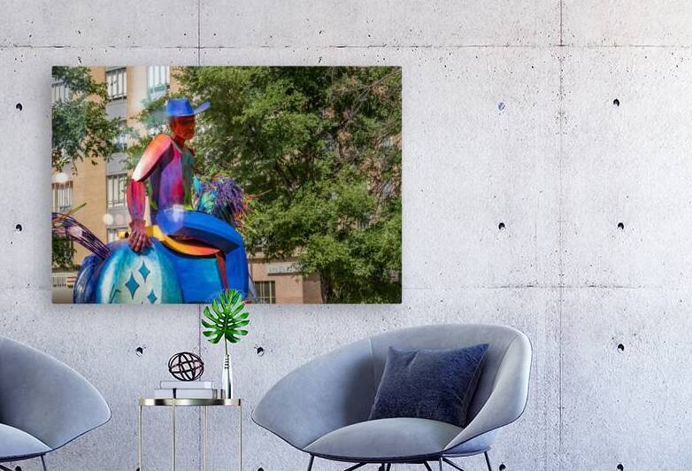 Tracking the end of the rainbow scuplture of cowboy on horse in  by Steve Heap