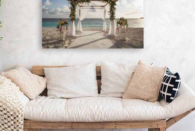 Wedding arch decorated on caribbean beach by Sergiu Gutium